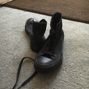 All black high top Converse